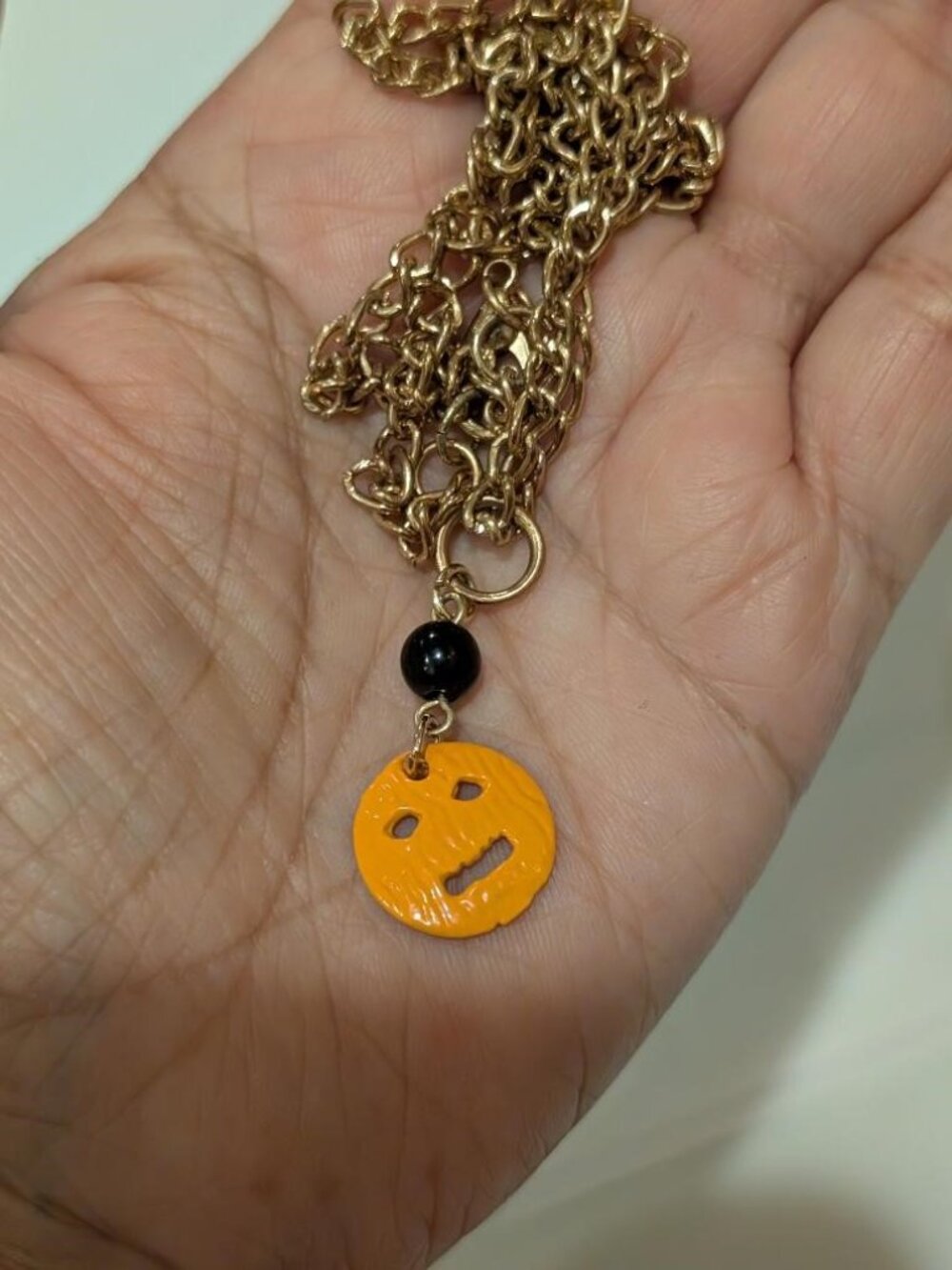 Vintage Halloween Gold Tone Orange Pumpkin with a Black Beat Pendant Necklace